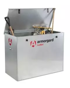 Armorgard ToolBin lightweight site storage box with open lid, filled with construction tools including spade and shovel, ideal for secure on-site storage